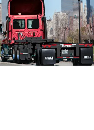 DCLI parked in front of cityscape 320x445 DCLI chassis parked in front of cityscape