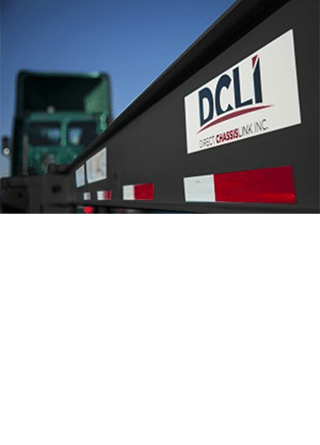 Side view of DCLI chassis attached to truck with no box