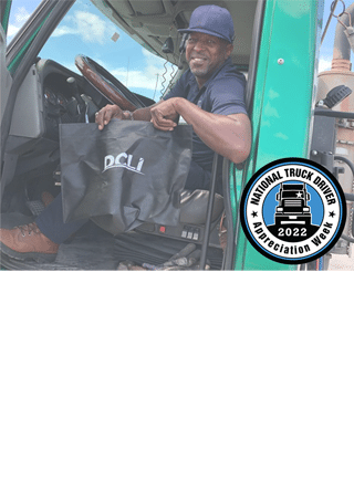 Thumbnail image of a trucker sitting in truck holding a DCLI bag