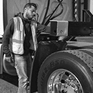 Trucker checking a DCLI chassis